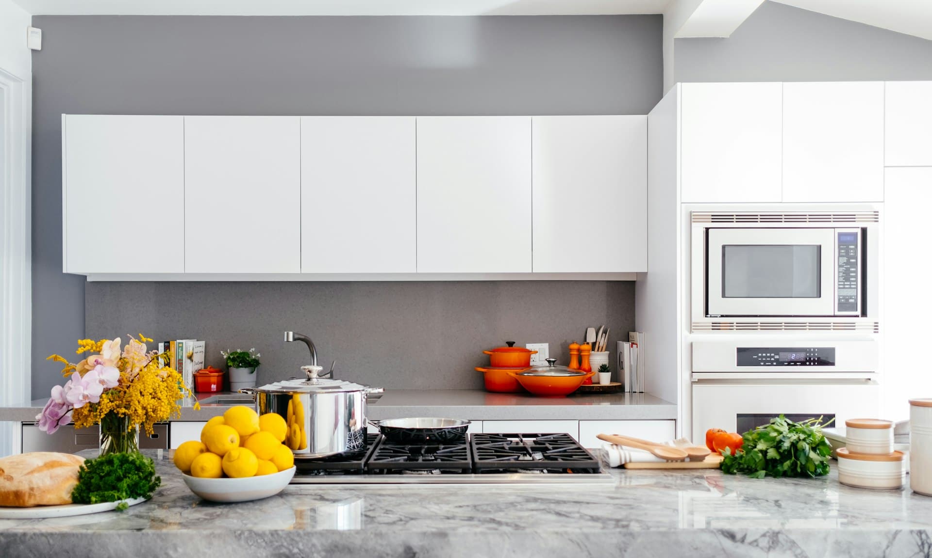 White kitchen with a gas range