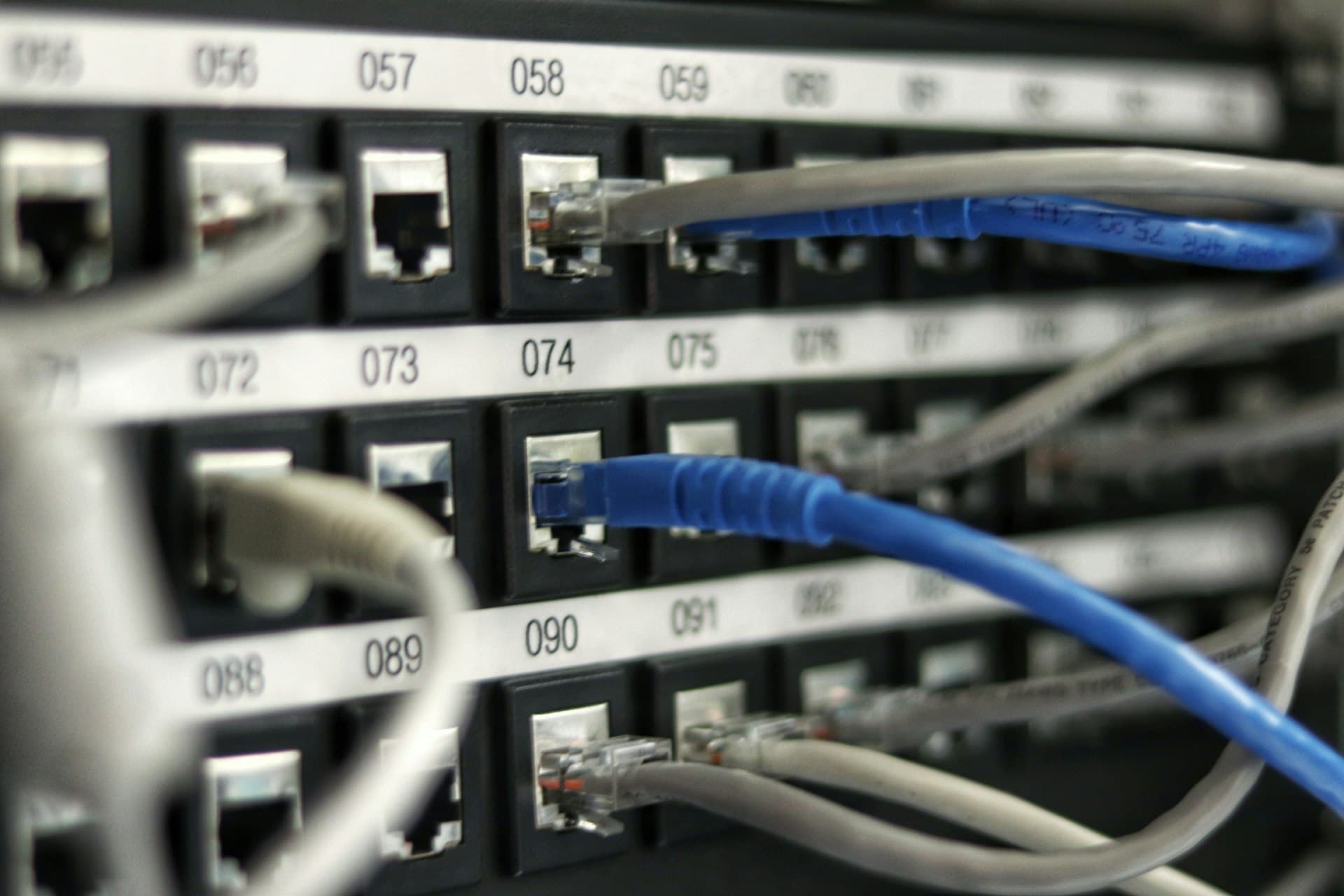 Network rack with neatly dressed cabling in a home equipment room