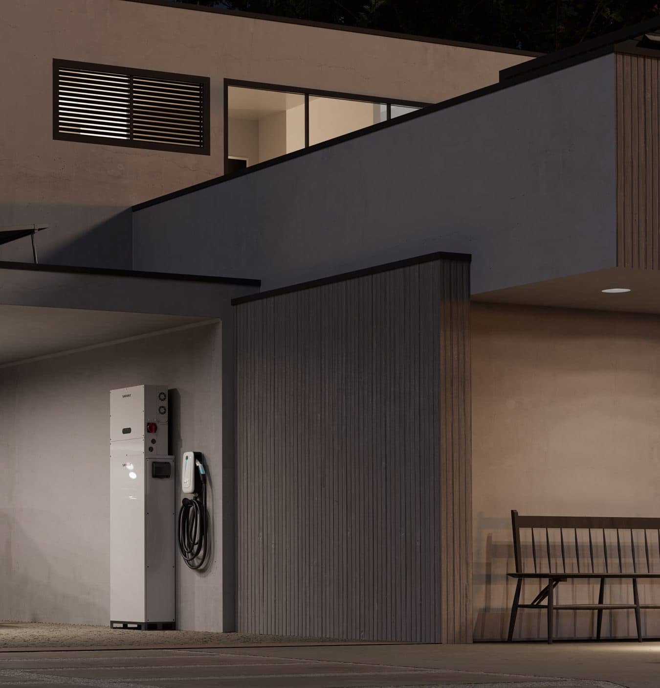 Savant Power Storage and an EV charger in the carport of a modern home at dusk